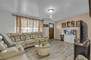 Living area with wood finish floors
