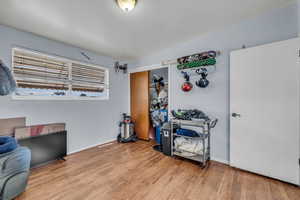 Bedroom with wood finished floors