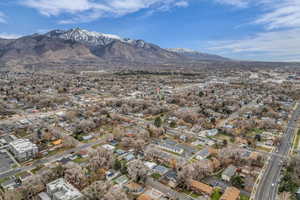 View of property location featuring a mountain backdrop and nearby suburban area