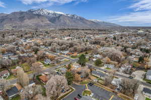 View of property location featuring a mountainous background and nearby suburban area