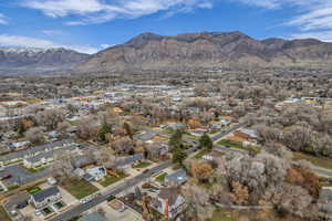 View of property location with a mountain backdrop and nearby suburban area
