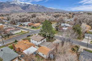 Aerial view of residential area featuring mountains