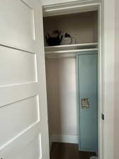 Main entry closet with a locker