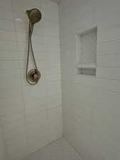 Tiled shower in basement bathroom