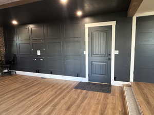 Family room with door to garage