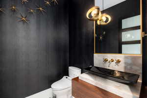 Bathroom featuring vanity and toilet