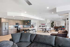 Living room featuring recessed lighting and light wood finished floors