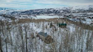 Snowy aerial view with a mountain view
