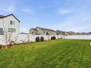 View of fenced backyard