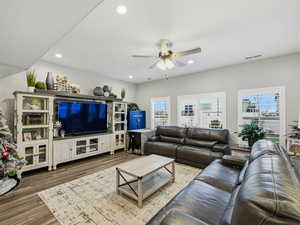 Living area featuring recessed lighting, wood finished floors, and ceiling fan