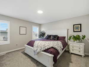 Bedroom featuring carpet flooring