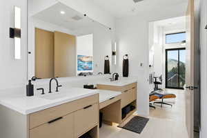 Full bathroom featuring double vanity and recessed lighting