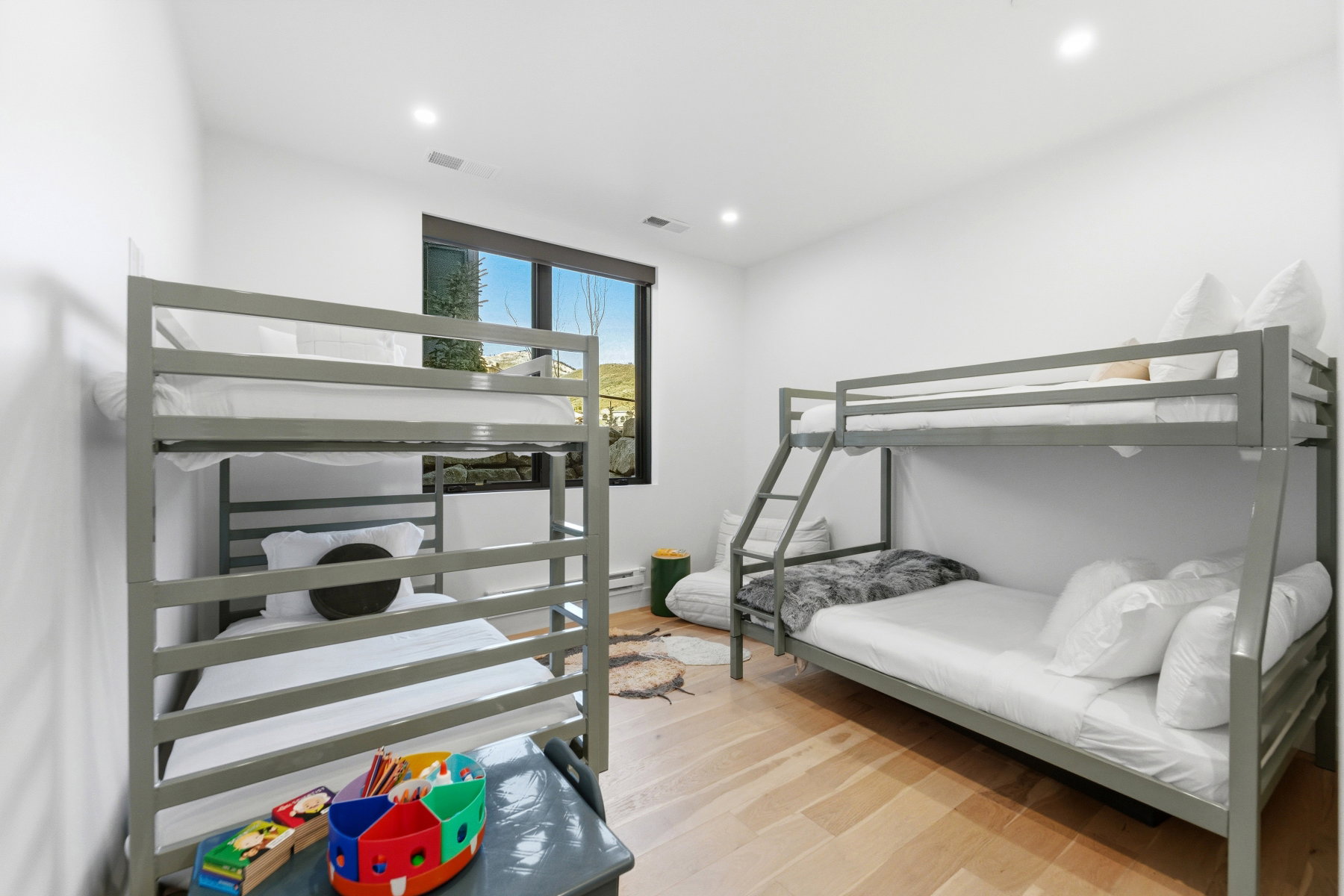 Bedroom with light wood-style floors