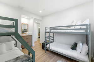 Bedroom featuring light wood-type flooring and recessed lighting
