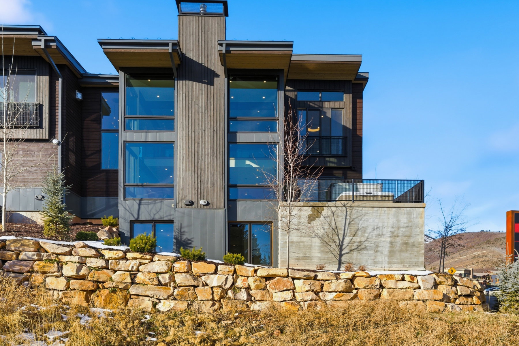 View of side of property featuring a chimney