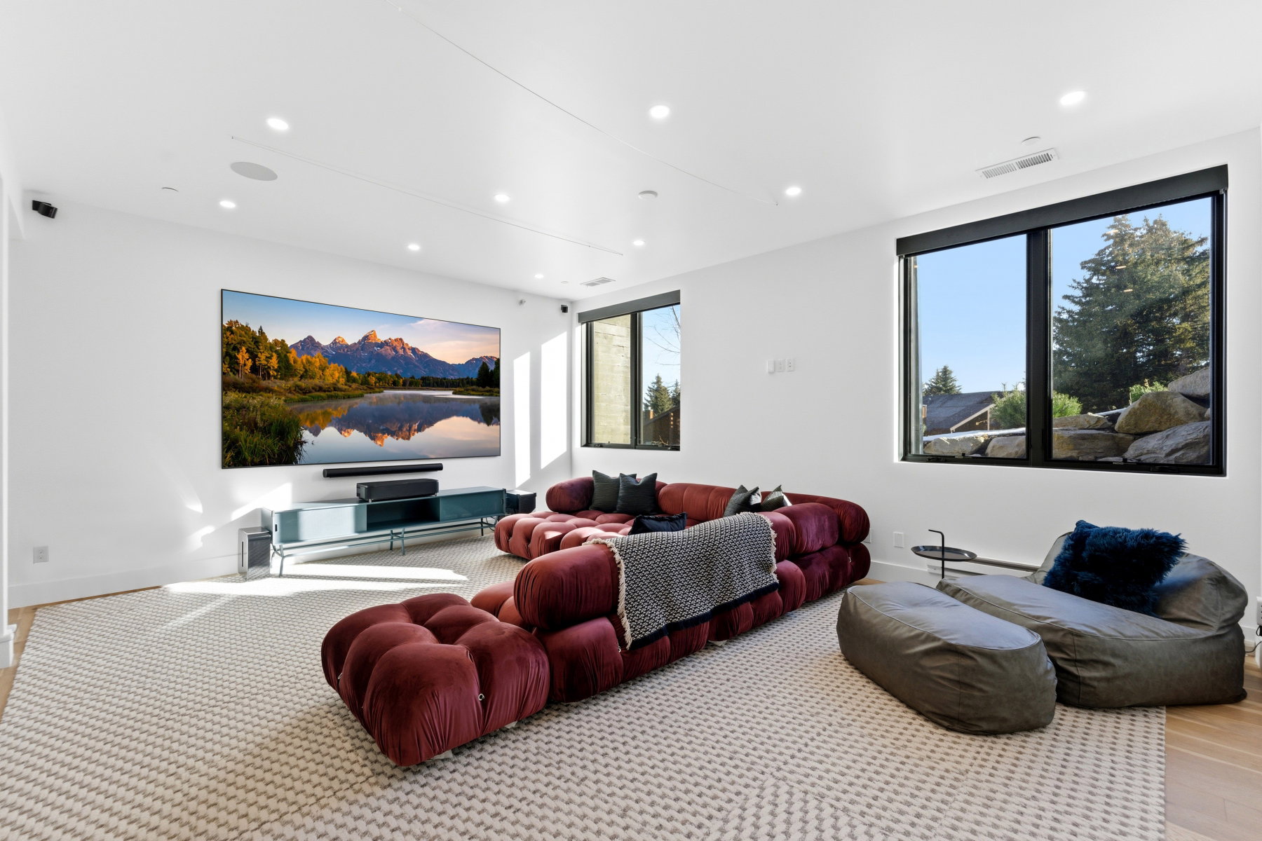 Home theater featuring recessed lighting and light wood-style floors