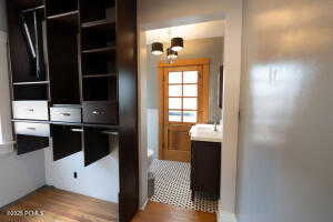 View of closet and bathroom.