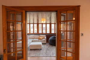 Sitting room featuring wood finished floors