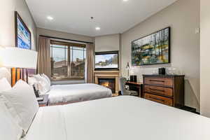 Suite with 2 queens, ski resort views, fireplace, kitchenette, and bathroom