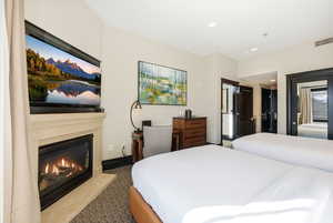 Suite with 2 queens, ski resort views, fireplace, kitchenette, and bathroom