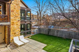 View of fenced backyard