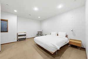 Bedroom featuring recessed lighting and light floors