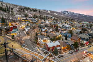 Aerial view of residential area with a mountainous background