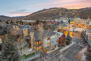 Aerial view at dusk of a mountain view and a residential view