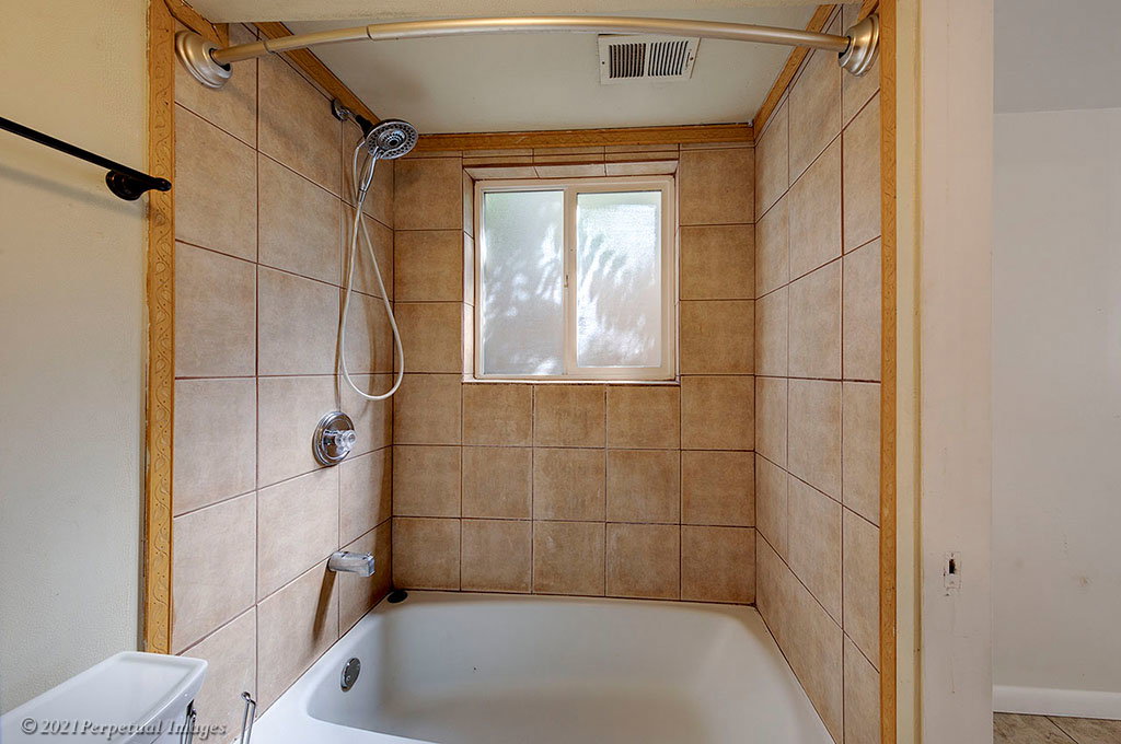 Bathroom featuring shower / bathtub combination