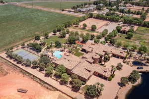 Aerial view of sparsely populated area featuring a pool