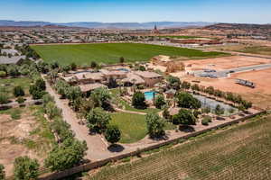 View of rural area featuring a mountainous background and a pool