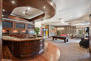 Rec room featuring billiards table, wood walls, recessed lighting, and ceiling fan