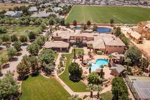 Aerial view of sparsely populated area with a pool area