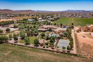 Aerial view of sparsely populated area with a mountainous background
