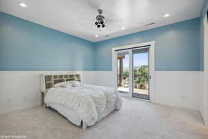 Bedroom with access to outside, recessed lighting, carpet flooring, and ceiling fan