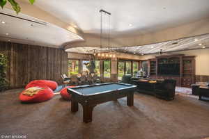 Playroom featuring wooden walls, pool table, carpet, and recessed lighting