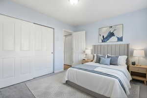 Bedroom featuring a closet and baseboards