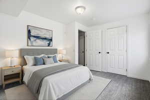 Bedroom with carpet flooring