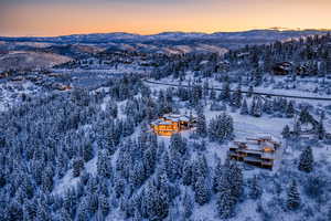 Snowy aerial view with a mountain view