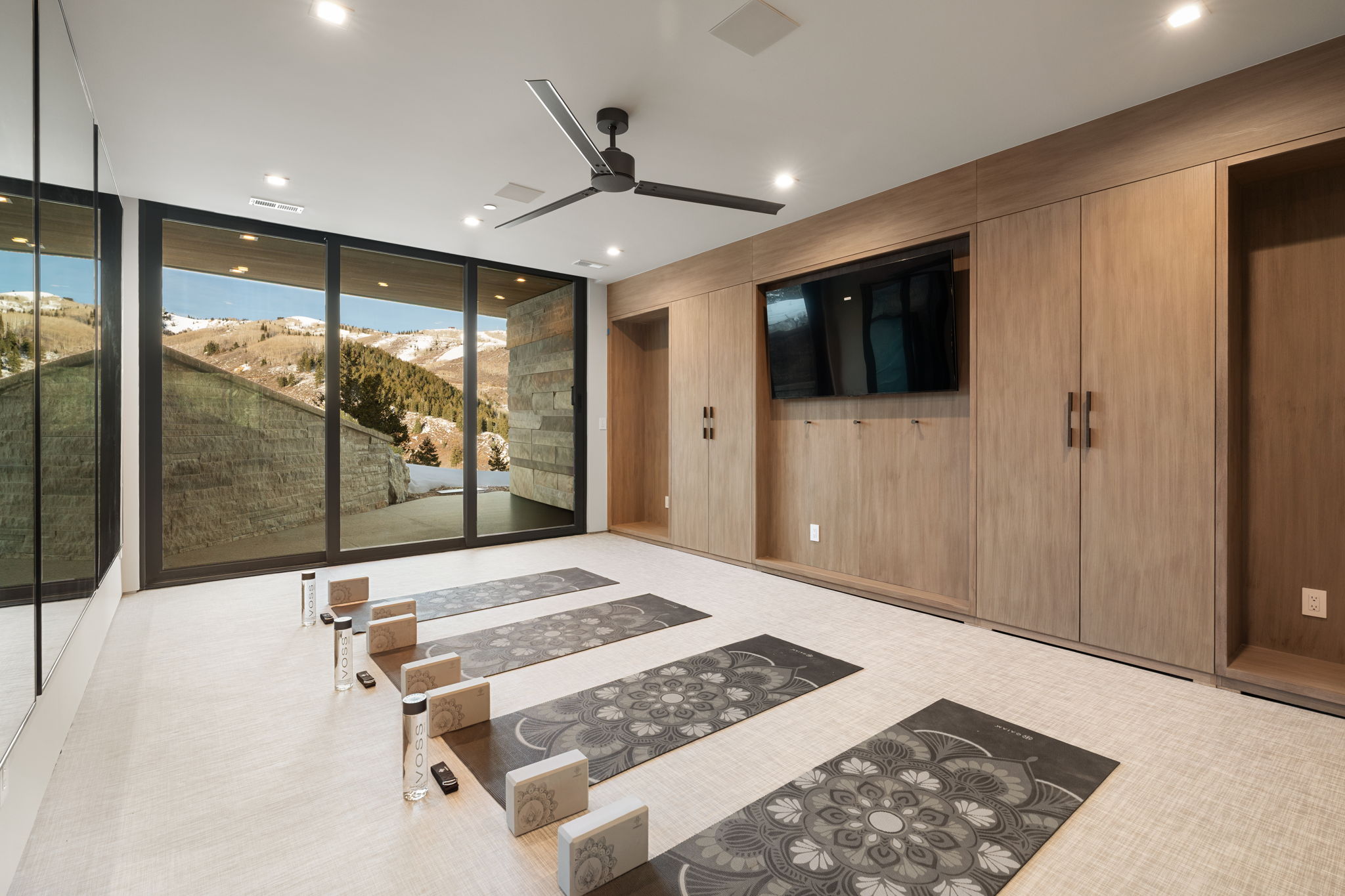 Bedroom featuring floor to ceiling windows, access to exterior, and recessed lighting