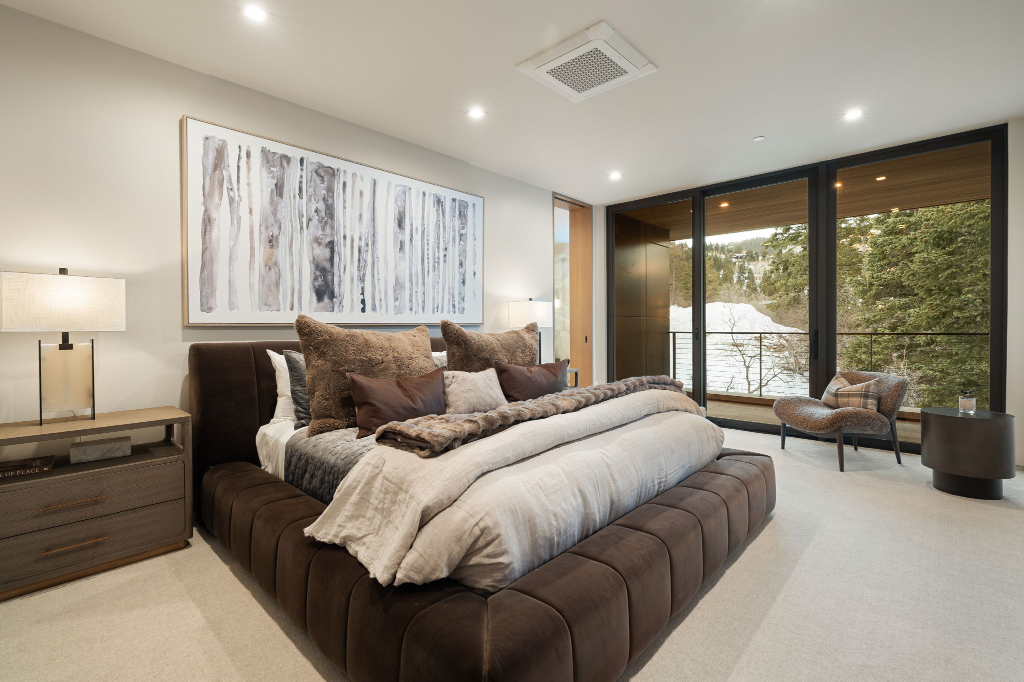Bedroom with access to exterior, light colored carpet, expansive windows, and recessed lighting