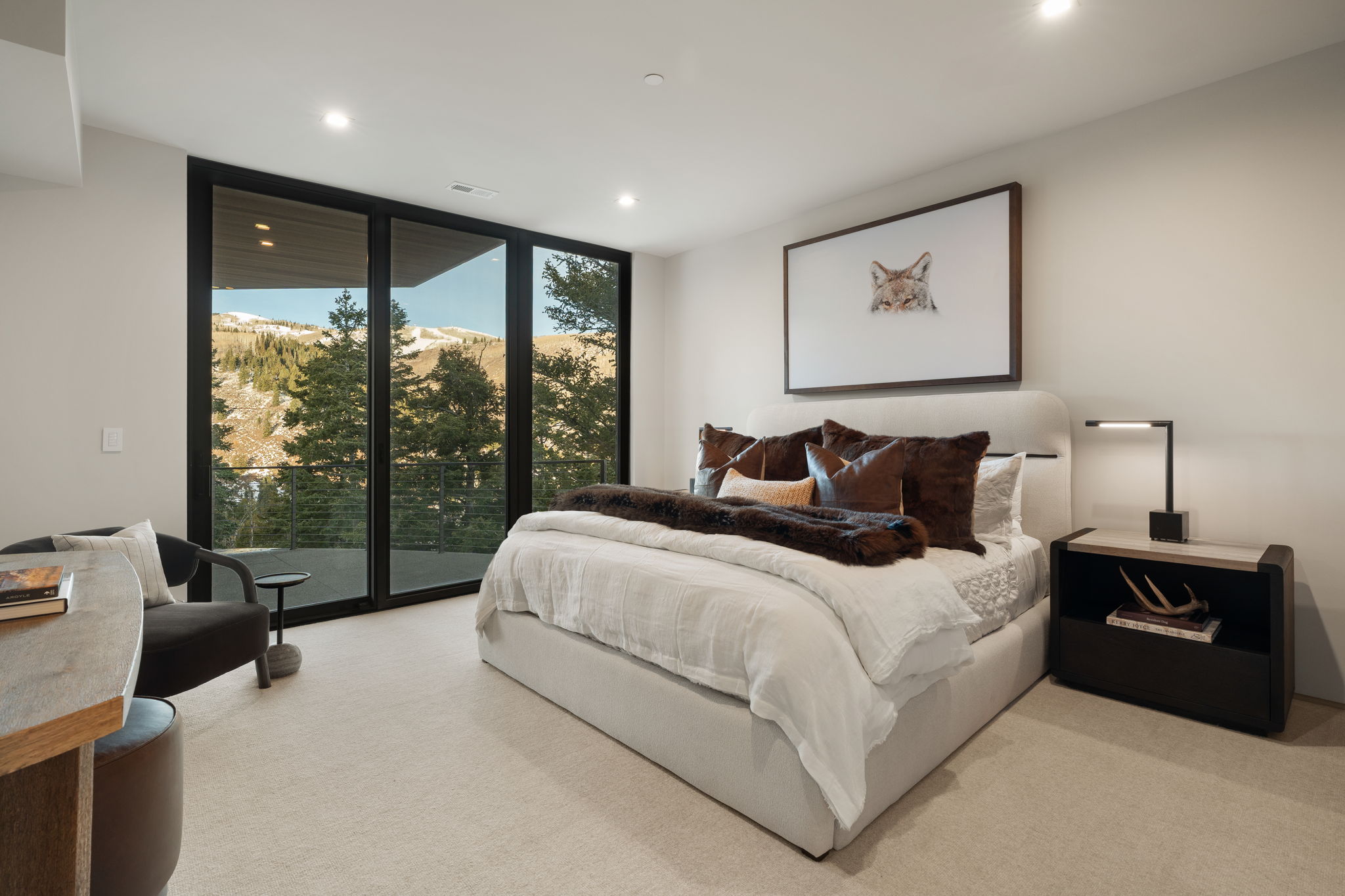 Bedroom with floor to ceiling windows, light carpet, access to outside, a mountain view, and recessed lighting