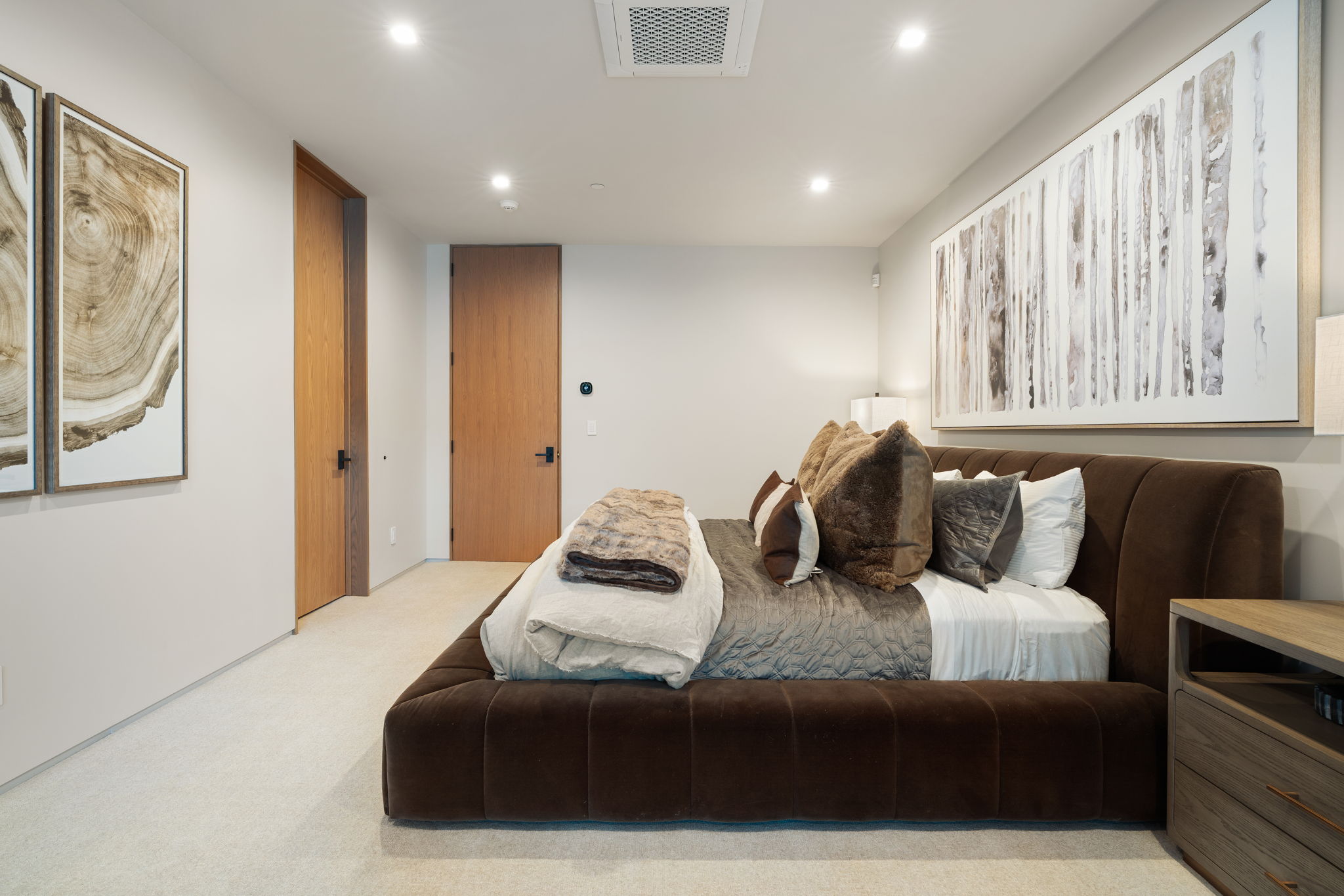 Bedroom featuring recessed lighting and light carpet
