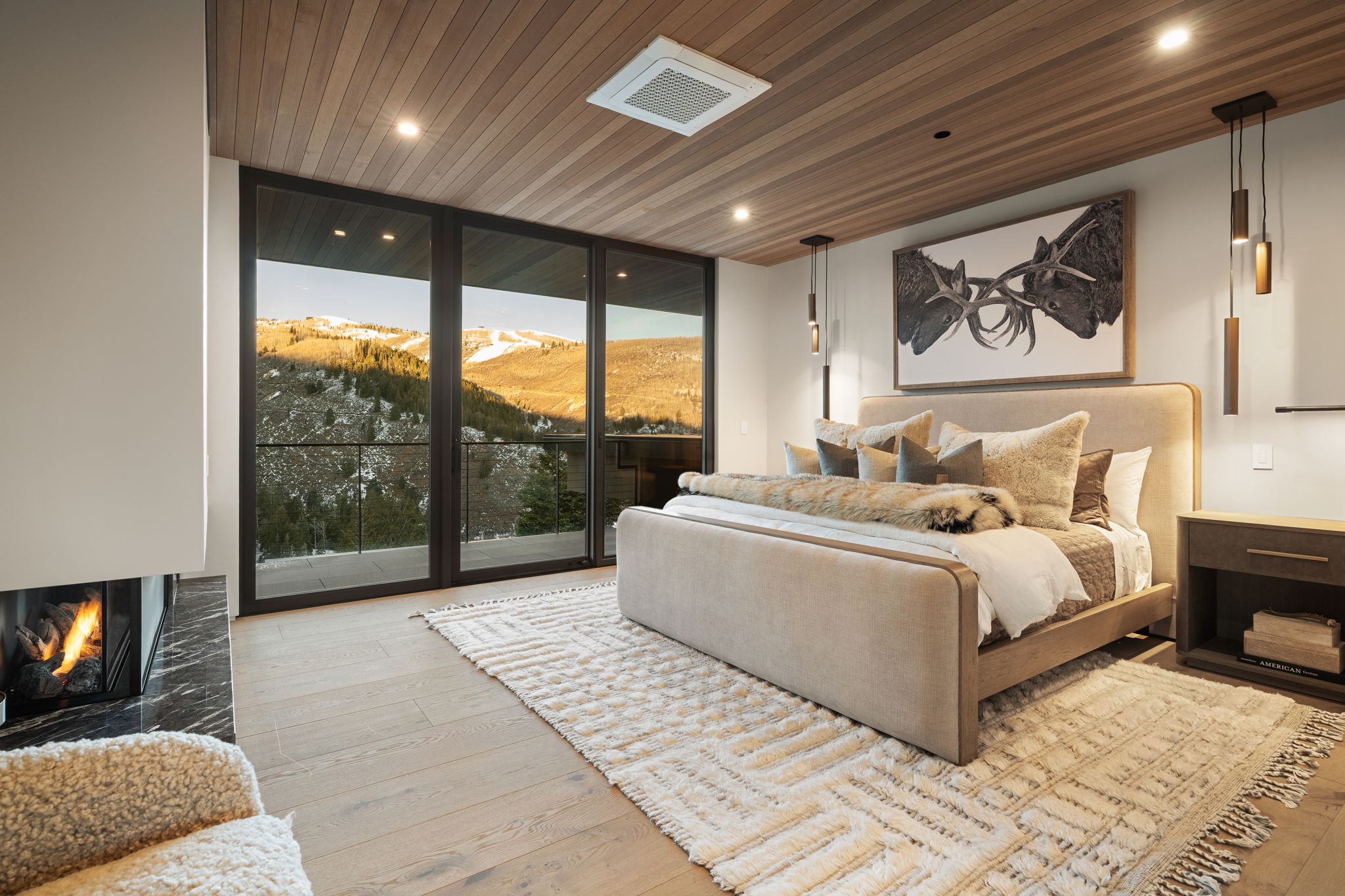 Bedroom featuring floor to ceiling windows, light wood finished floors, wood ceiling, access to outside, and recessed lighting
