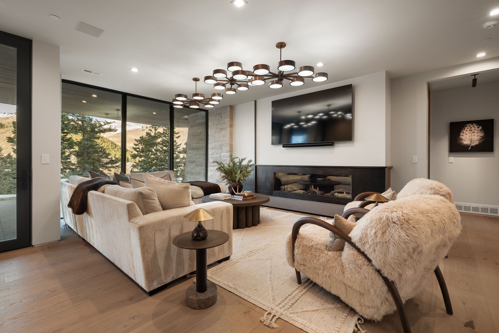 Building lobby with recessed lighting and floor to ceiling windows