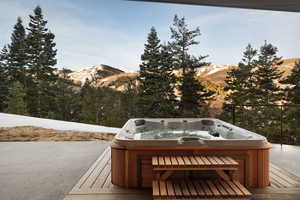 Wooden deck featuring a mountain view