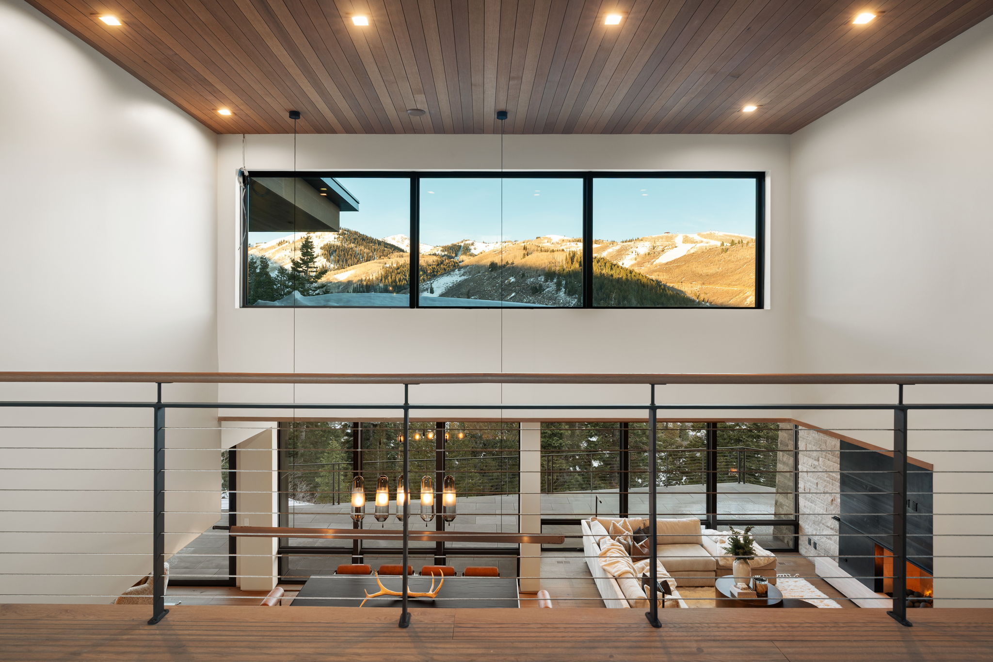 Interior space featuring a high wooden ceiling, recessed lighting, and plenty of natural light