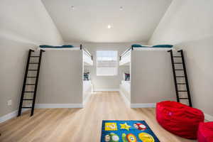 Unfurnished bedroom with light wood-style flooring and recessed lighting