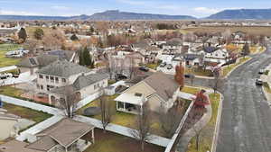 Aerial view of residential area with a mountainous background
