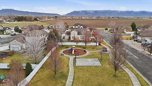 Aerial view of residential area with a mountainous background